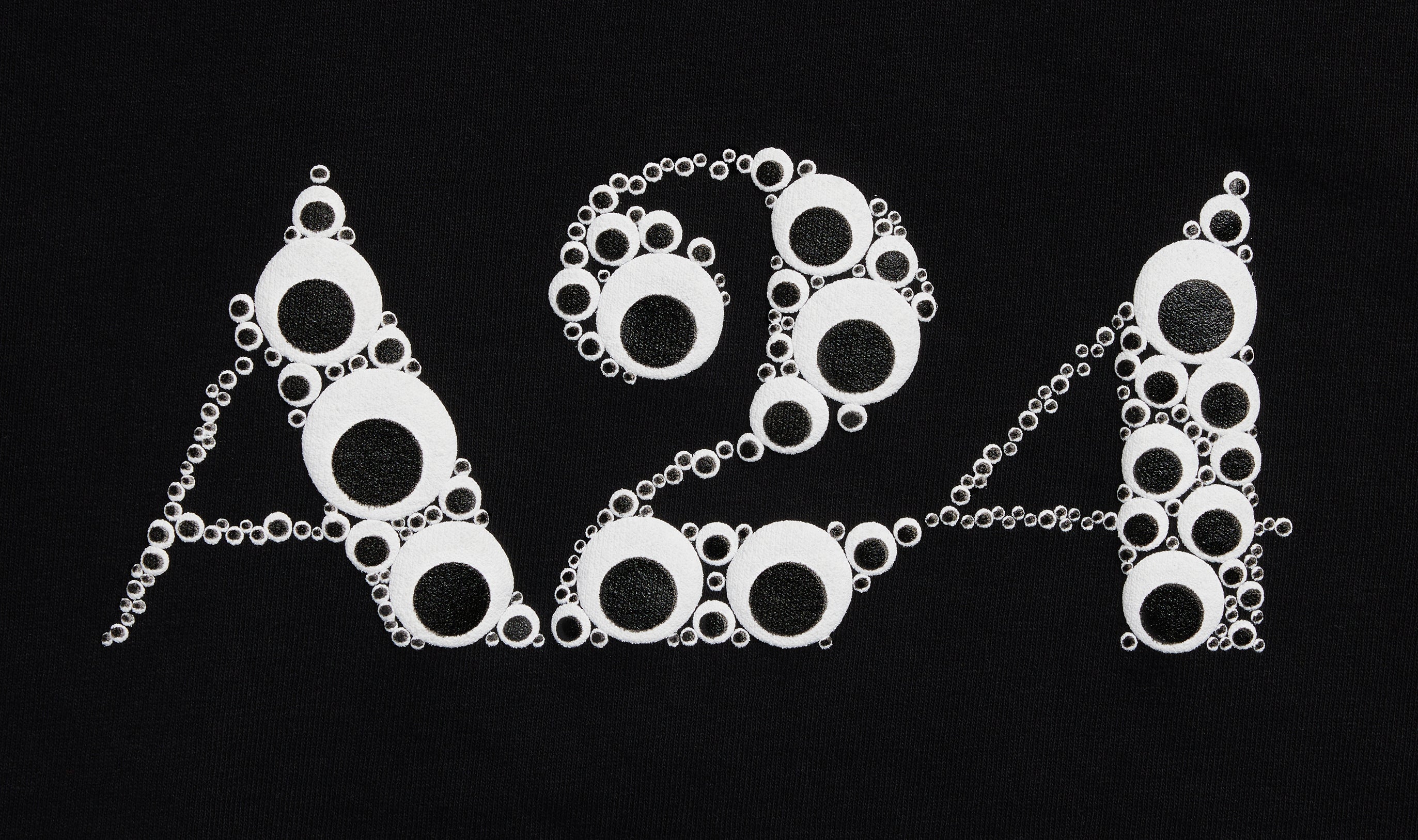 Black Googly Eye Puff Print Logo Tee